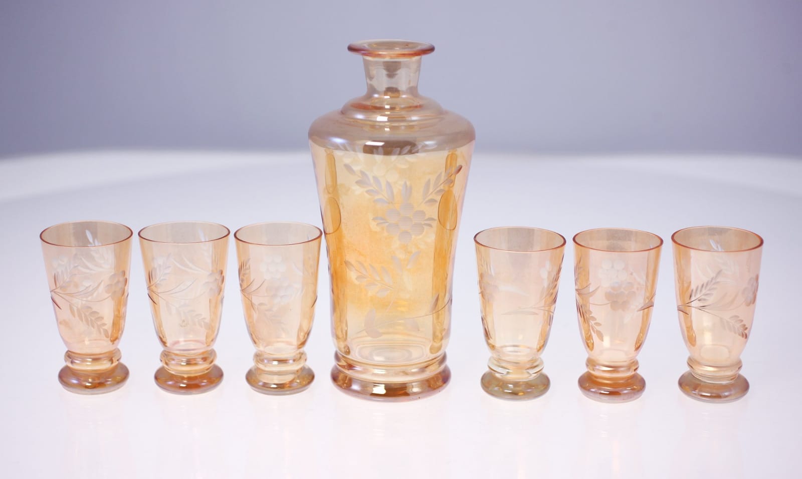 Amber glass liquor decanter set with six matching tumblers