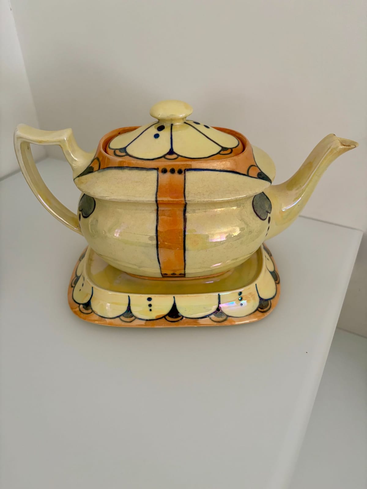 Decorative ceramic teapot with stand