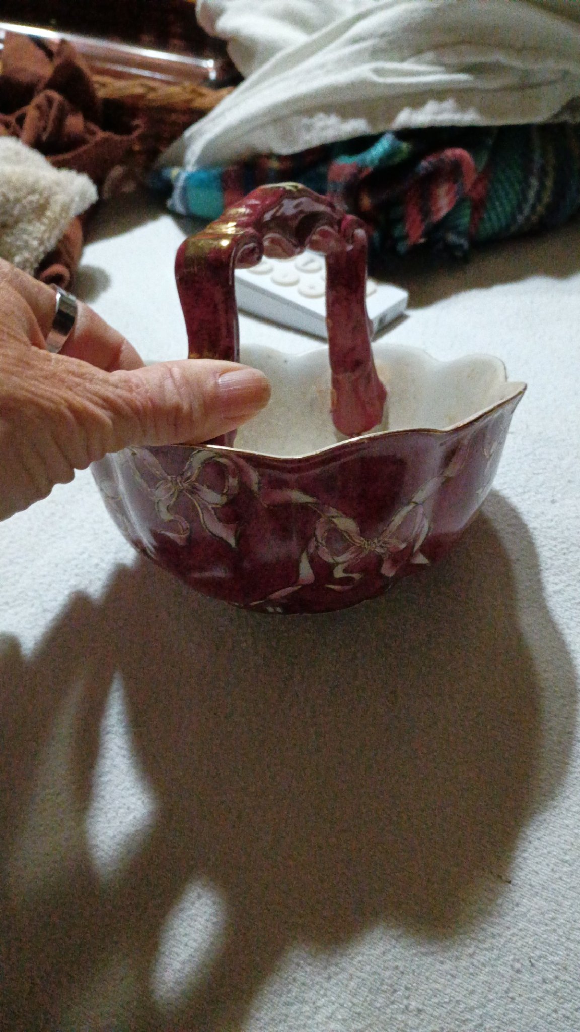 Decorative handled porcelain or ceramic basket bowl
