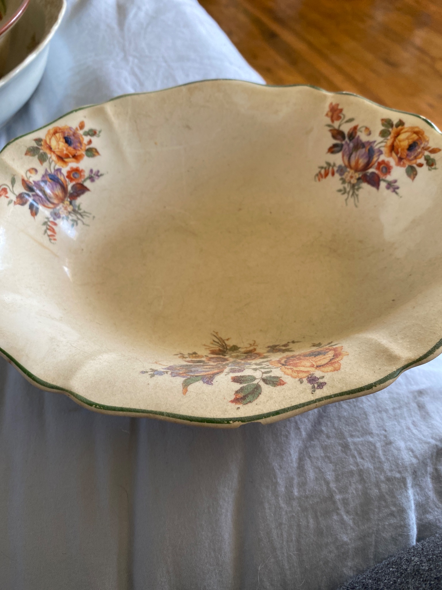 Floral transferware or hand-decorated ceramic serving bowl