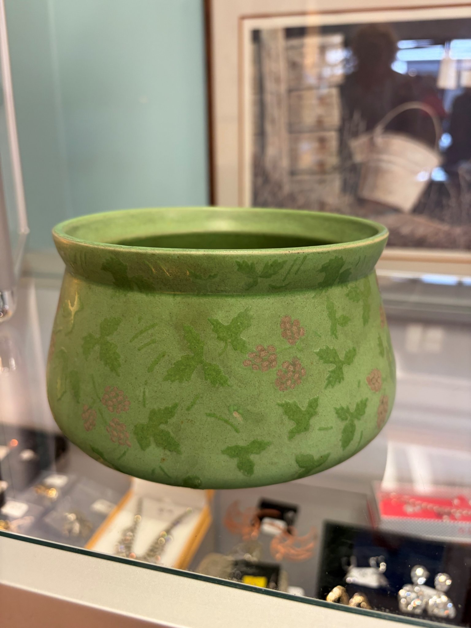 Green glazed ceramic bowl or cachepot with floral/vine decoration