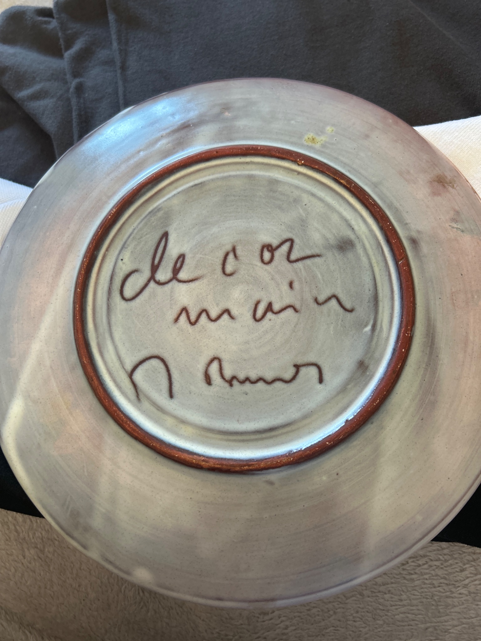 Hand-thrown ceramic bowl or plate with handwritten inscription/signature