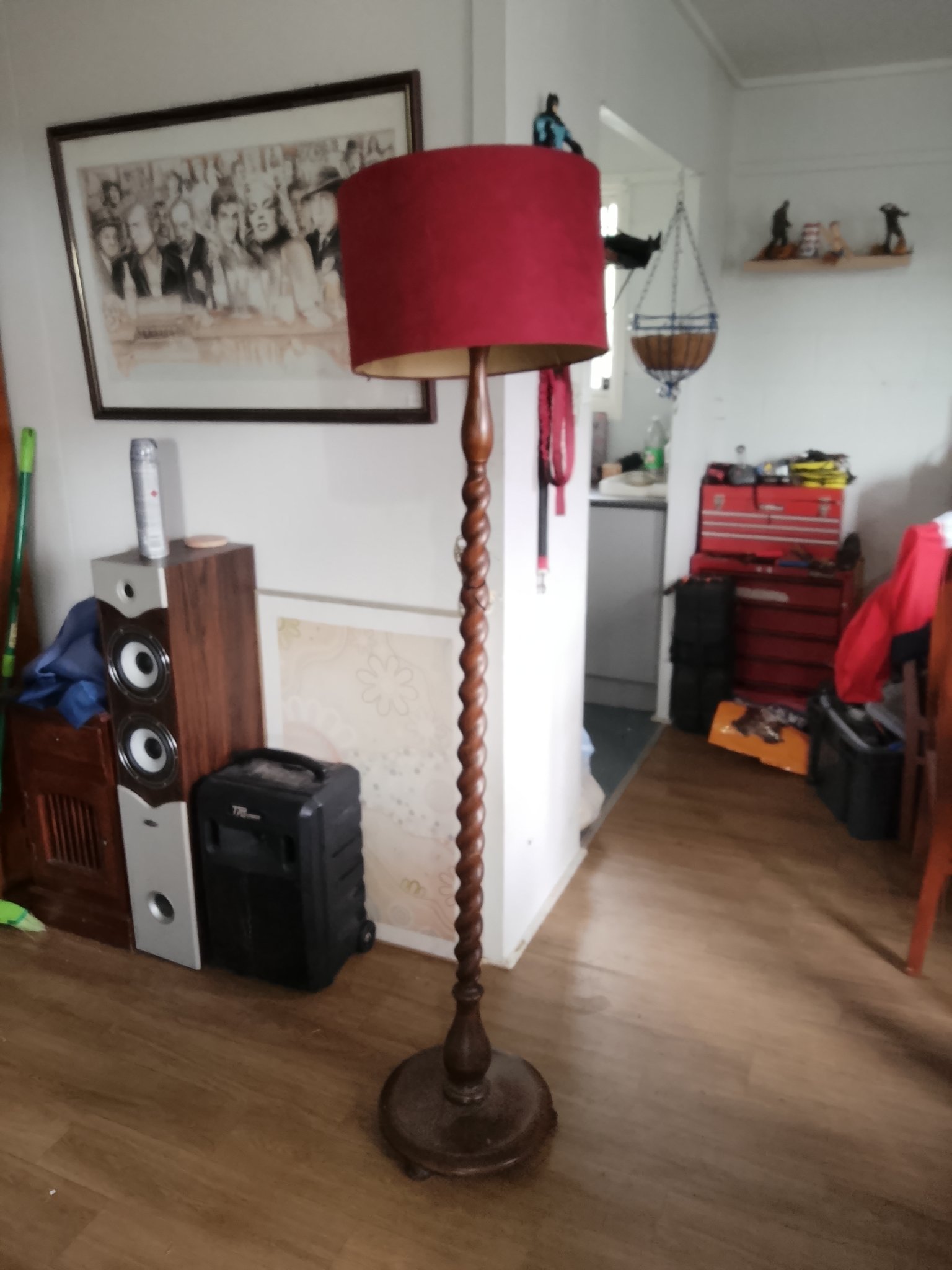 Turned wooden floor lamp with fabric shade