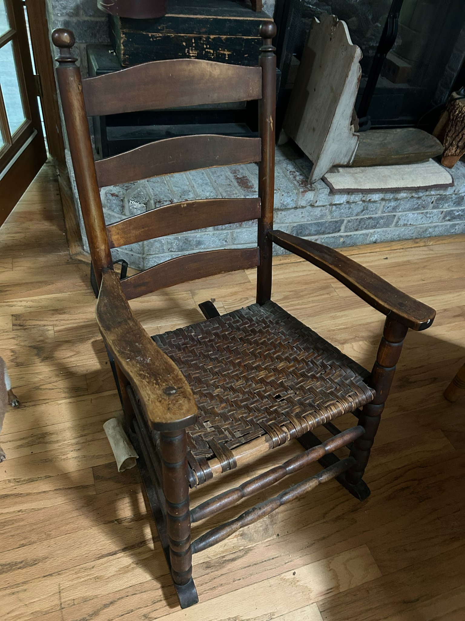 Windsor-style ladder-back armchair with woven seat